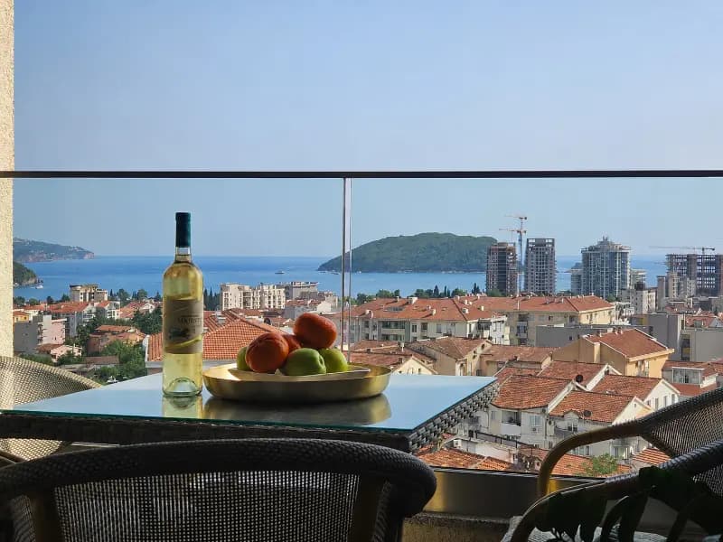 Large three-bedroom apartment with direct sea view in Budva